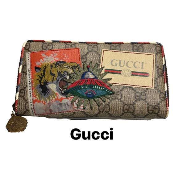 Gucci Handbags - Gucci UFO Guccissima Courrier Zip Around Long Wallet